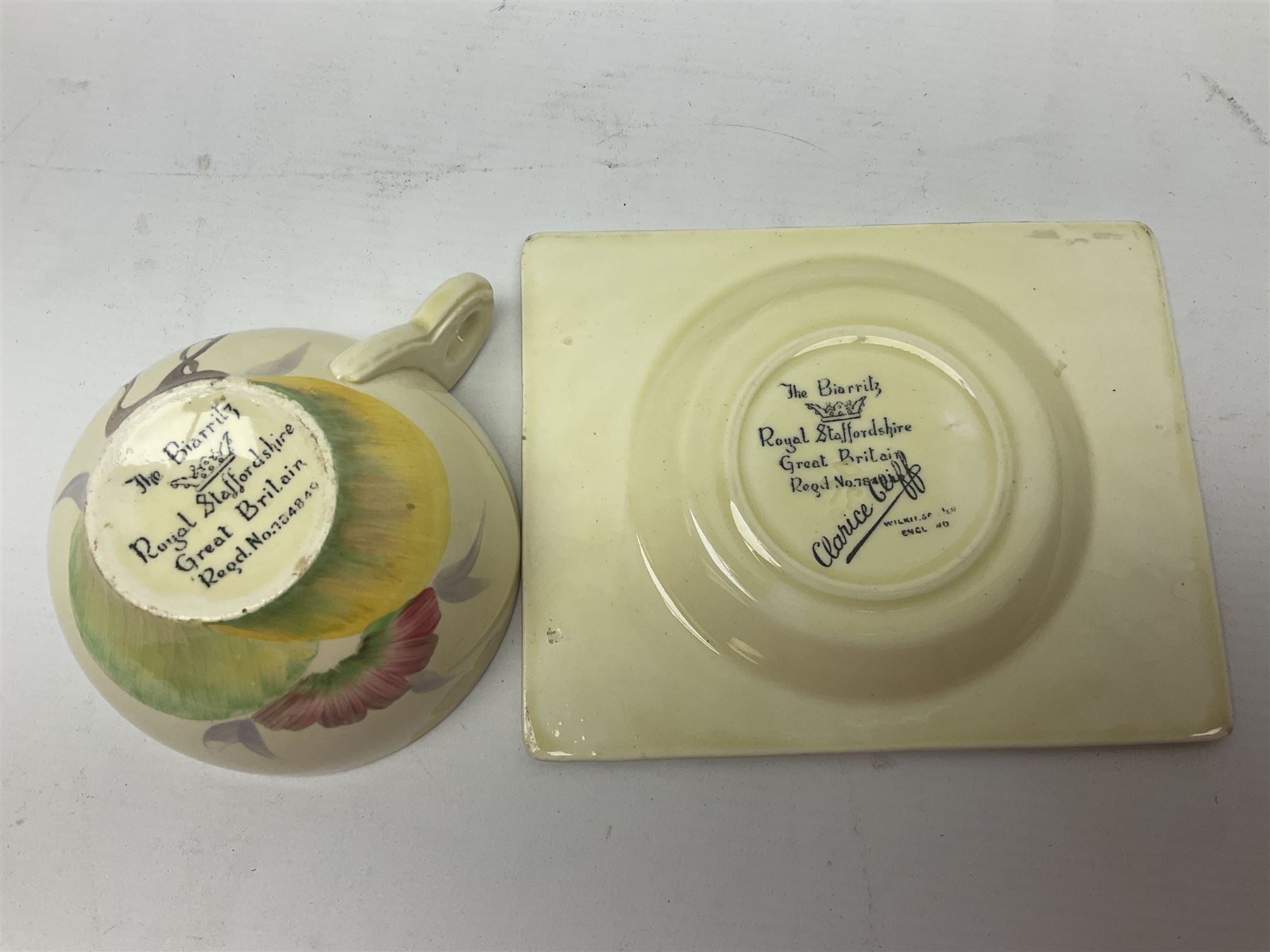Clarice Cliff Biarritz for Royal Staffordshire/Wilkinson Ltd, teacup, saucer and side plate, in Viscaria pattern, the plate and saucer of rectangular form, each with printed mark beneath