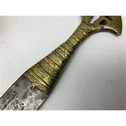 Northern Nigerian 'Nupe' arm dagger, the 40cm steel blade with unusual rounded tip, cast and pierced brass hilt and matching brass mounted leather scabbard 56cm overall