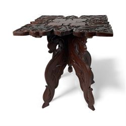 Eastern hardwood folding occasional table, carved with dragons