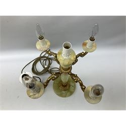  20th century gilt metal and onyx four branched candelabra upon a circular base, and onyx table lamp in the form of an urn, tallest example H48cm