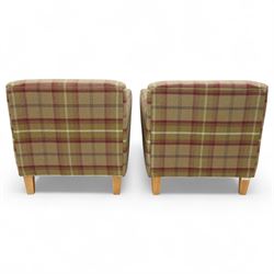 Contemporary pair of upholstered armchairs, in red and green chequered fabric with loose seat and back cushions, box arms and light stained square legs