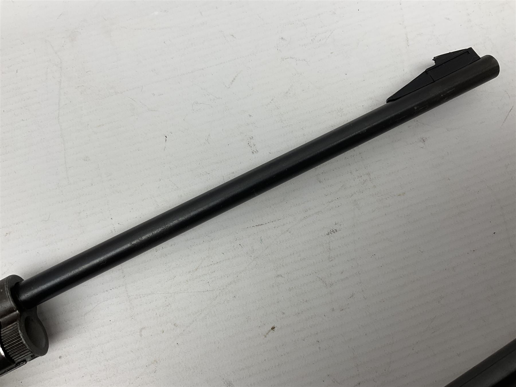 Crosman 760 .177 cal. Junior air rifle with under lever faux pump action and simulated wooden fittings; serial no.278047476, L90cm overall; and SMK B1 Synthetic .22 cal. Youth's air rifle with break-barrel action and 4 x 20 scope; serial no.1721229956084915F, L98.5cm overall (2)  NB: AGE RESTRICTIONS APPLY TO THE PURCHASE OF AIR WEAPONS.