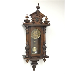  Late 19th century beech and walnut cased Vienna style wall clock, the dial with embossed owl decoration, twin train movement striking on coil, H96cm  