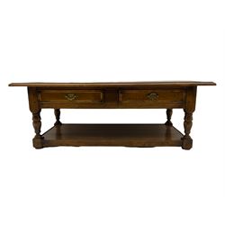 Traditional oak rectangular coffee table, crossbanded top, fitted with two drawers and under-tier