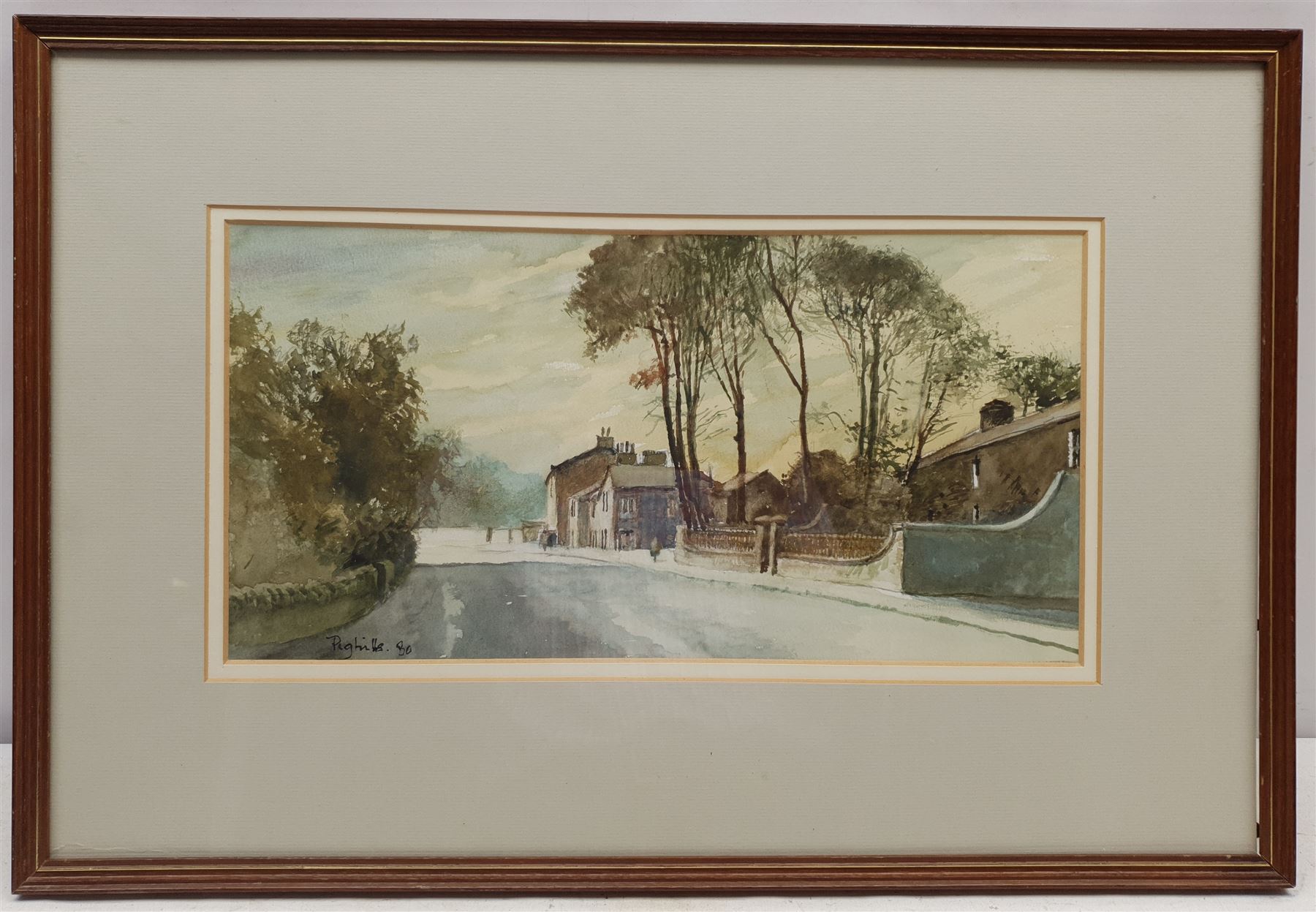 Joseph Pighills (British 1902-1984): 'The Main Street Lothersdale', watercolour signed and dated '80, with Bradford Art Gallery exhibition catalogue verso Cat. No.30, 19cm x 37cm