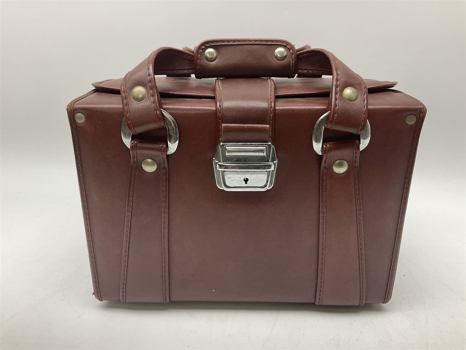 Zenza Bronica ETRS camera body, safari edition, serial no. 7100811, with 'Zenza Bronica Zenzanon EII 1:2.8 f=75mm' lens, serial no. 7908591, film magazine back, safari, serial no. 8100564, AE-ii metering head, safari, serial no. 617024, etc, all in leather case