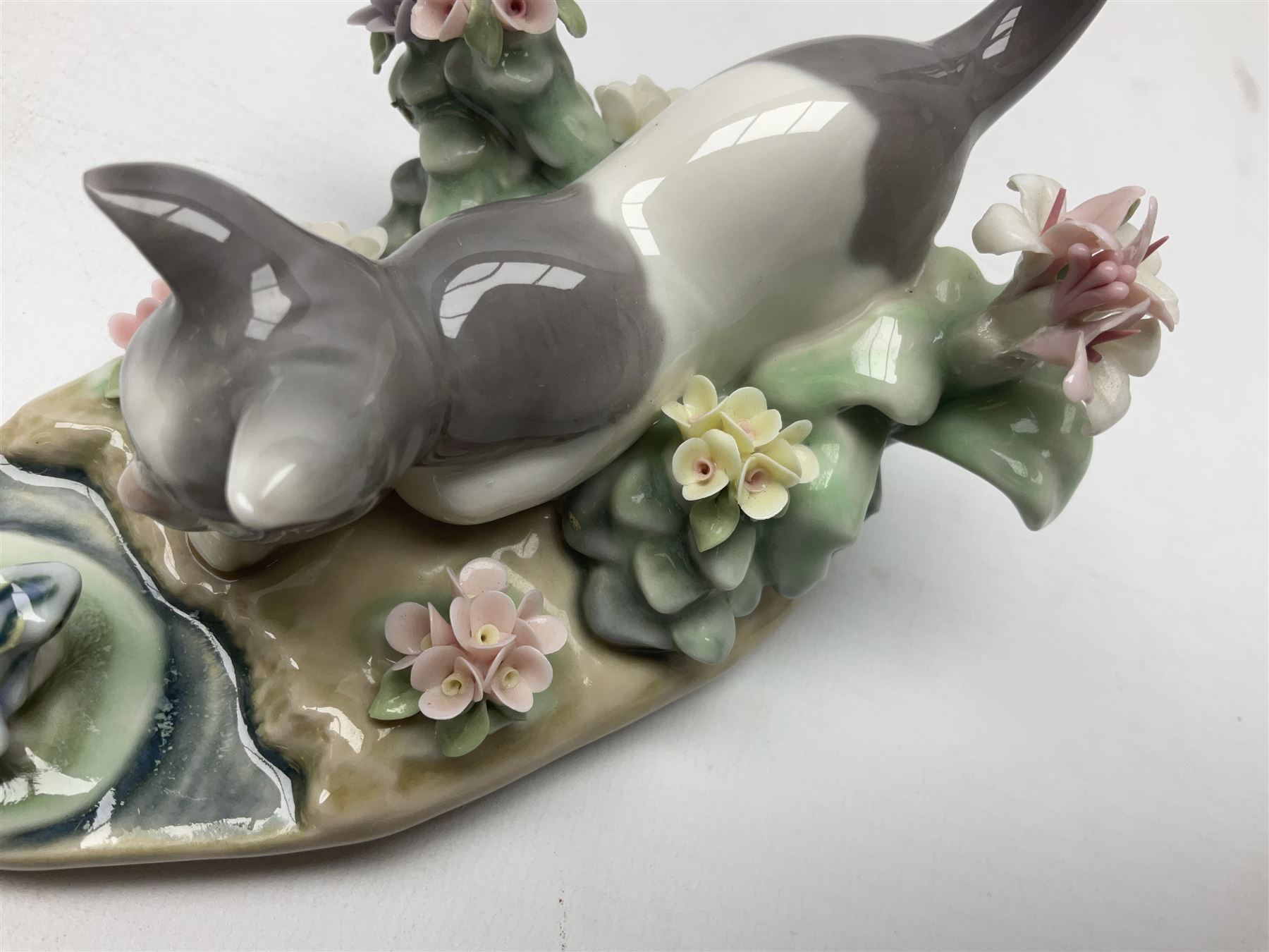 Six Lladro figures, comprising Naughty Dog no 4982, Best Friend 7620 and My Buddy no 7609, Kitty Confrontation no 1442, It Wasn't Me no 7672 and Rabbit Eating no 4772, three with original boxes, largest example H22cm