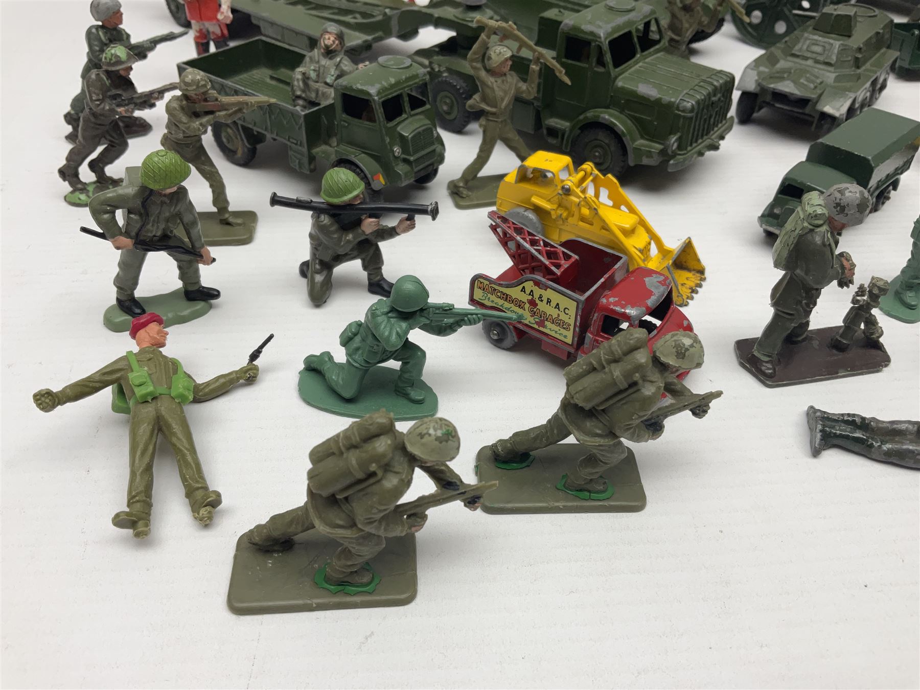 Various makers - unboxed and playworn die-cast models including Dinky Thornycroft Mighty Antar Tank Transporter No.660 and Centurion Tank No.651, other military and farm vehicles; and quantity of loose plastic soldiers and other figures by Crescent, Britains etc