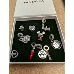 Ten silver Pandora charms, including Mickey Mouse, Pudsey Bear etc, all stamped S925 ALE, in one Pandora box