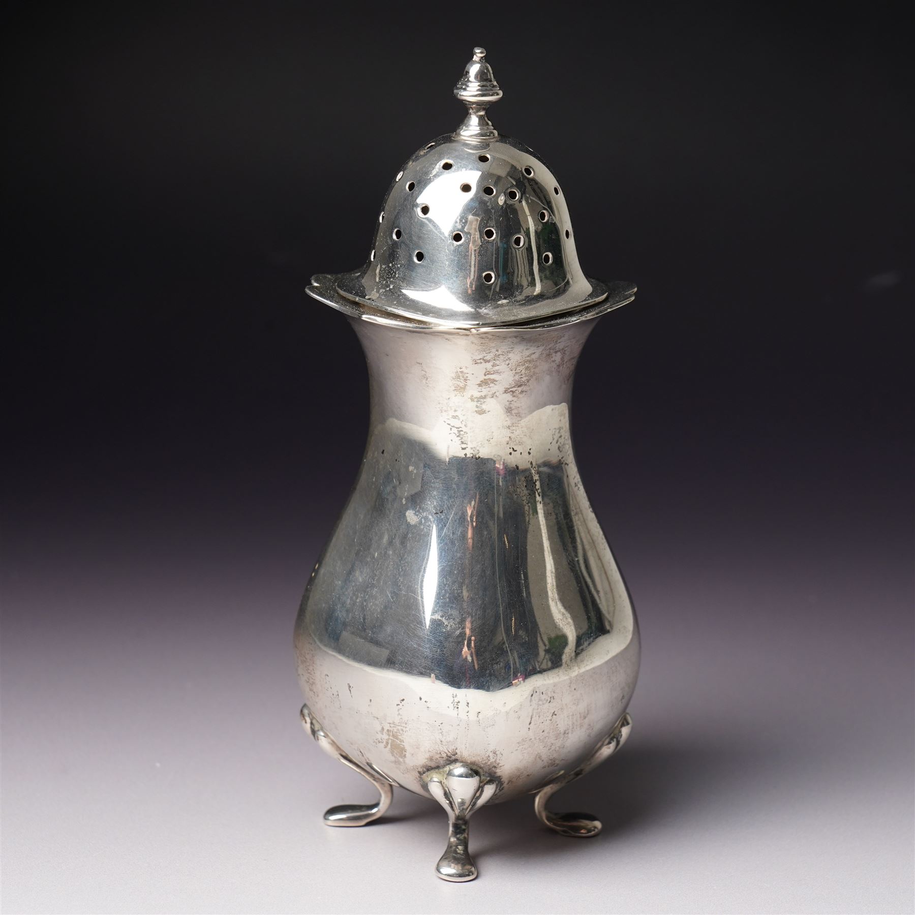 Edwardian silver sugar caster with pierced cover and shaped supports Birmingham 1904 Maker Alexander Clark Manufacturing Co.