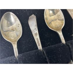 Small group of silver, comprising cased set of six coffee spoons, pair of sugar tongs, and napkin ring, all hallmarked, approximate total silver weight 71 grams