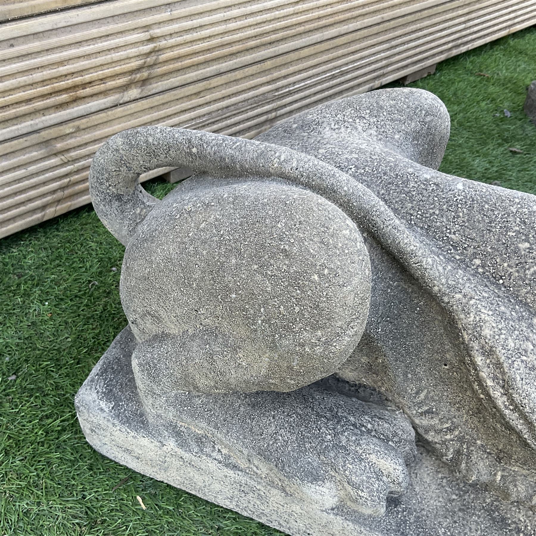 Pair of large cast stone recumbent garden lions, on plinth base  - THIS LOT IS TO BE COLLECTED BY APPOINTMENT FROM DUGGLEBY STORAGE, GREAT HILL, EASTFIELD, SCARBOROUGH, YO11 3TX