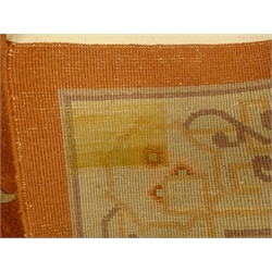  Chinese orange ground rug, central medallion, repeating border, 246cm x 152cm  