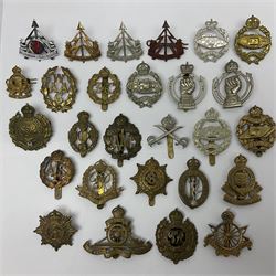 Twenty-seven military metal cap badges including Royal tank Corps, Reconnaissance Corps, Royal Armoured Corps, Royal Corps of Signals, Womens Army Auxiliary Corps, Queen Mary's Army Auxiliary Corps, Auxiliary Territorial Service,  Royal Engineers, REME, Army physical Training Corps etc 