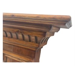 Victorian stained pine fire surround, projecting cornice with dentil moulding, panelled frieze and chamfered uprights on block supports