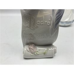 Three Lladro figures, comprising Dear Santa no 6166, Angelic Melody 1993 no 5963 and Seraphs Head no2 no 4885, together with Lladro plaque Love Brings Us Together no 7677, all with original boxes, largest example H18cm