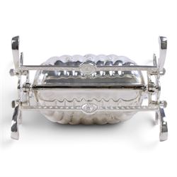 Silver-plated Victorian style biscuit box, in a shell form with engraved leaf detailing, upon scroll feet, H24cm