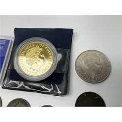 Two Great British Queen Elizabeth II five pound coins and a small number of other coins