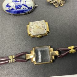 9ct gold jewellery including leaf brooch, wishbone Mizpah brooch, carnelian brooch, gold cased ladies Omega wristwatch, on leather strap and gold cased ladies Tissot wristwatch on expanding gilt strap, together with silver brooches and a Czech paste buckle, etc