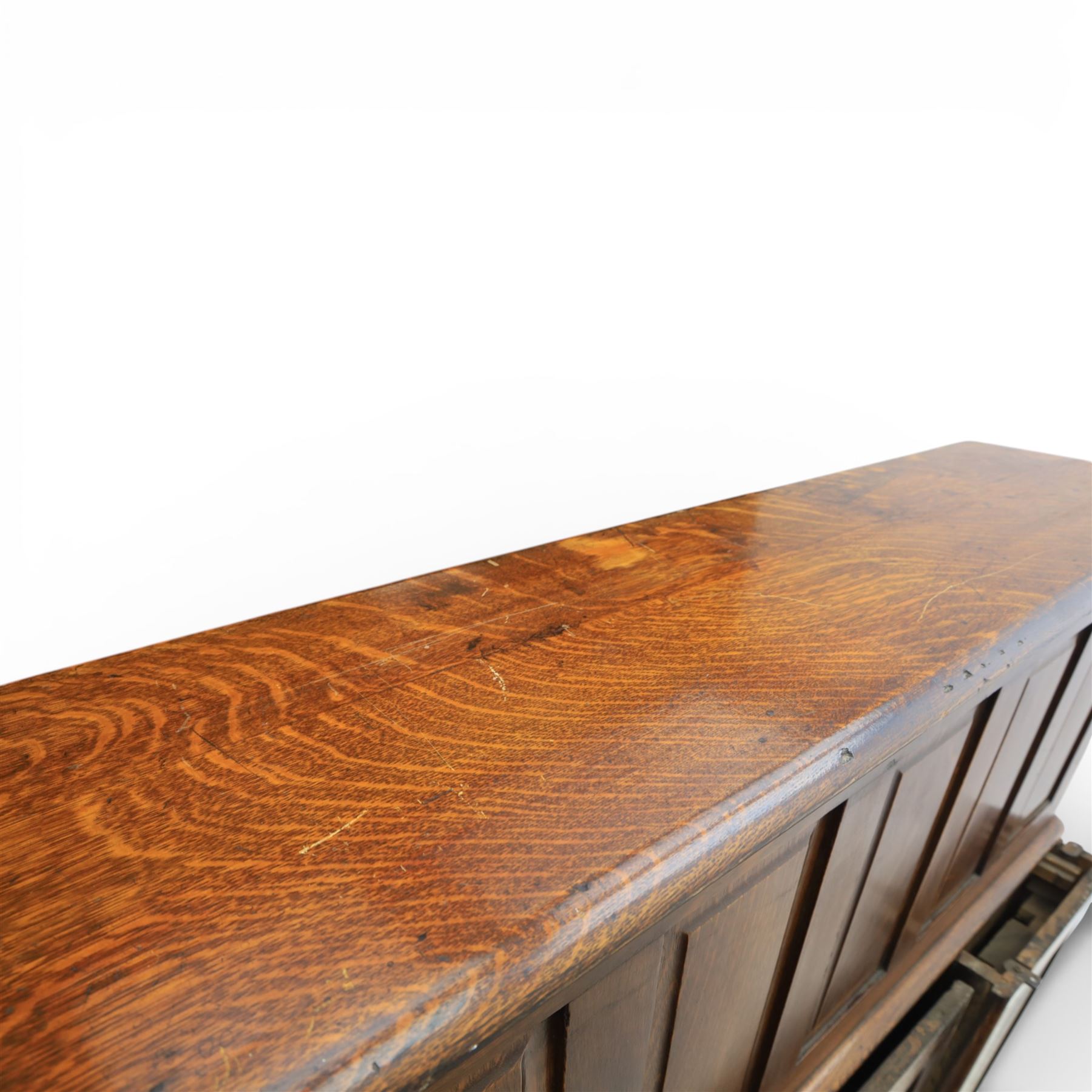 Globe Wernicke - Oak roll top desk, tambour roll top enclosing a fitted interior, raised on two pedestal bases with fitted drawers, raised on a plinth base 