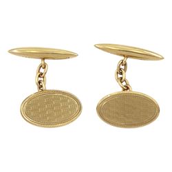 Pair of early 20th century 9ct gold cufflinks with engine turned decoration, Chester 1928