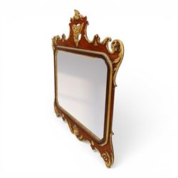 Large George III mahogany wall mirror, parcel gilt shaped frame with scrolling acanthus, shell and foliate decoration, surmounted by carved gilt ho-ho bird, rectangular mirror plate within moulded border, shaped apron with gilt scroll terminals, removed from a Scottish country estate