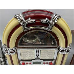 CD player in the form of a juke box, together with a Ferguson stereo and a vintage style radio