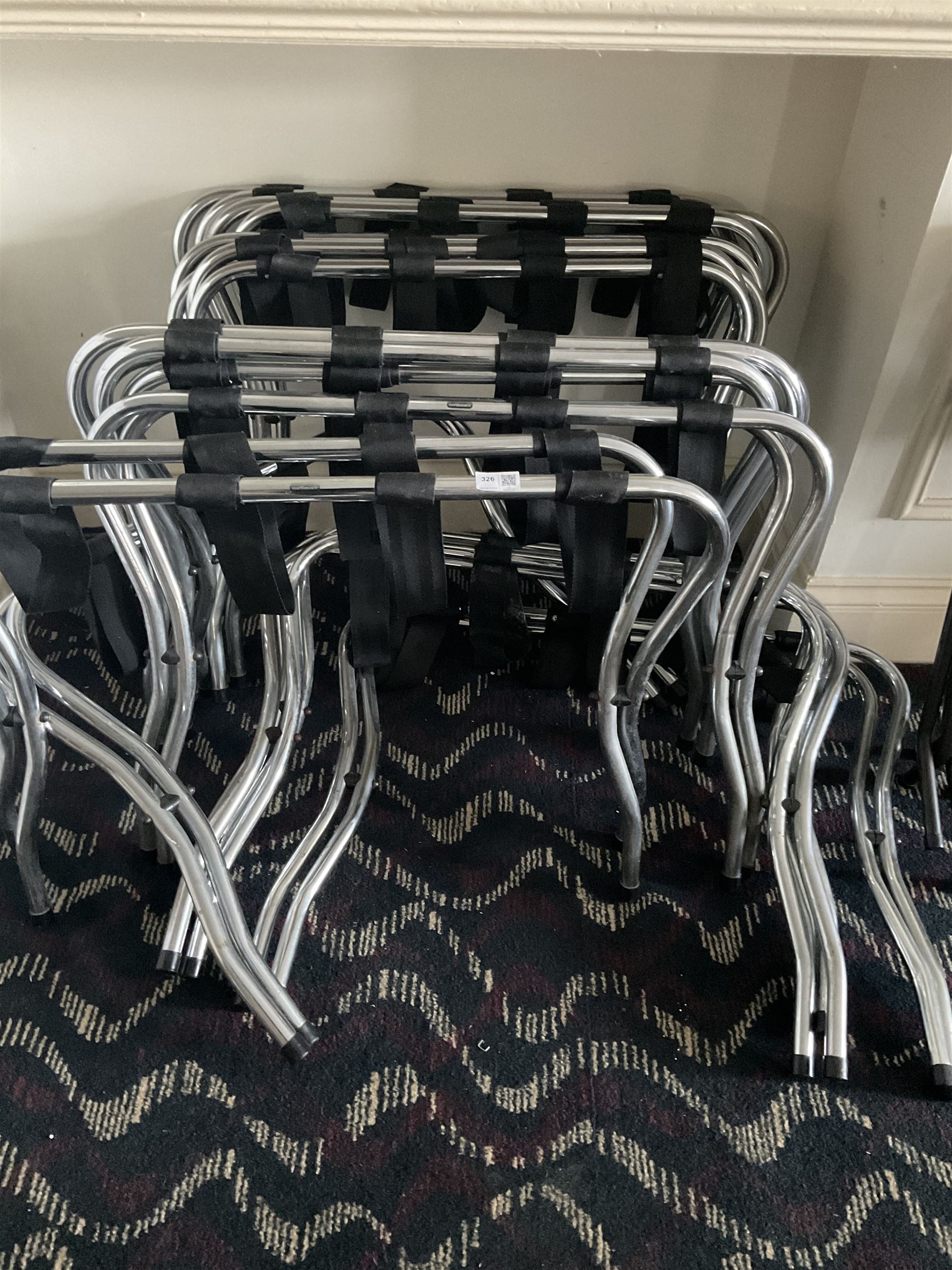 Sixteen folding luggage stands (16)- LOT SUBJECT TO VAT ON THE HAMMER PRICE - To be collected by appointment from The Ambassador Hotel, 36-38 Esplanade, Scarborough YO11 2AY. ALL GOODS MUST BE REMOVED BY WEDNESDAY 15TH JUNE.