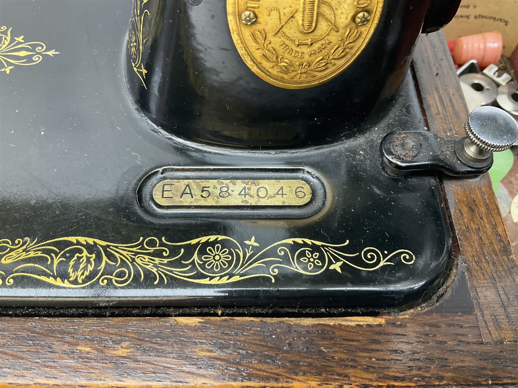 Singer sewing machine no. EA584046 in case (missing key) and Singer Manual of Family Sewing Machines