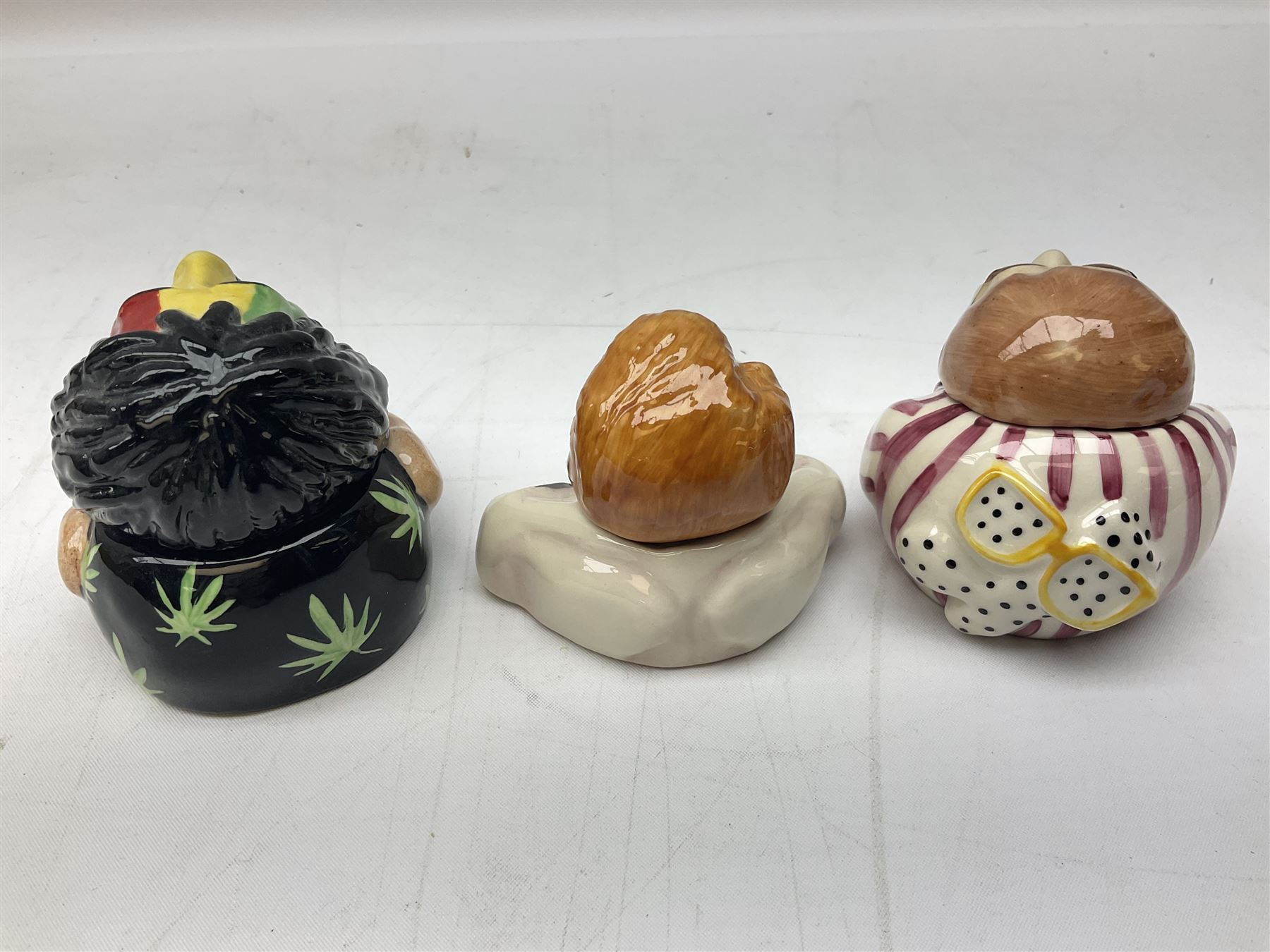 Fifteen Face Pots by Kevin Frances, all of music interest, to include the Beatles; Paul 'Kookoocachu', 'Love Is All You Need', 'Octopus's garden', 'While My Guitar Gently Weeps', 'All You Need Is Love' and 'Everybody's talking and no one says a word', Elton John; I'm still standing, Buddy Holly; 'That will be the day', David Bowie 'We can be heroes' , Mick Jagger prototype colour type etc, all boxed  