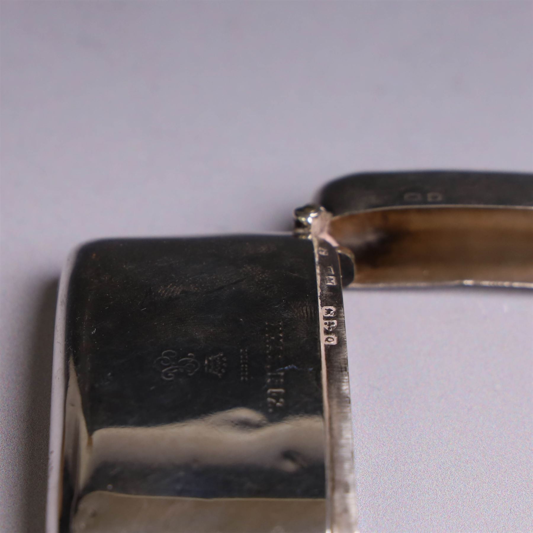 Edwardian silver cigarette and vesta case, each engraved 'XMAS 1902 from' above a noble cypher, both hallmarked Henry Matthews, vesta case Chester 1899, cigarette case Birmingham 1898, both with retailers stamps for Drew & Sons