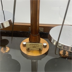 Set of cased brass and chrome laboratory scales by J.W. Towers Widnes Model 75, with black vitrolite type base, upward sliding front and hinged side doors, W40cm H47cm; with bakelite cased set of weights by ETA Instruments Ltd