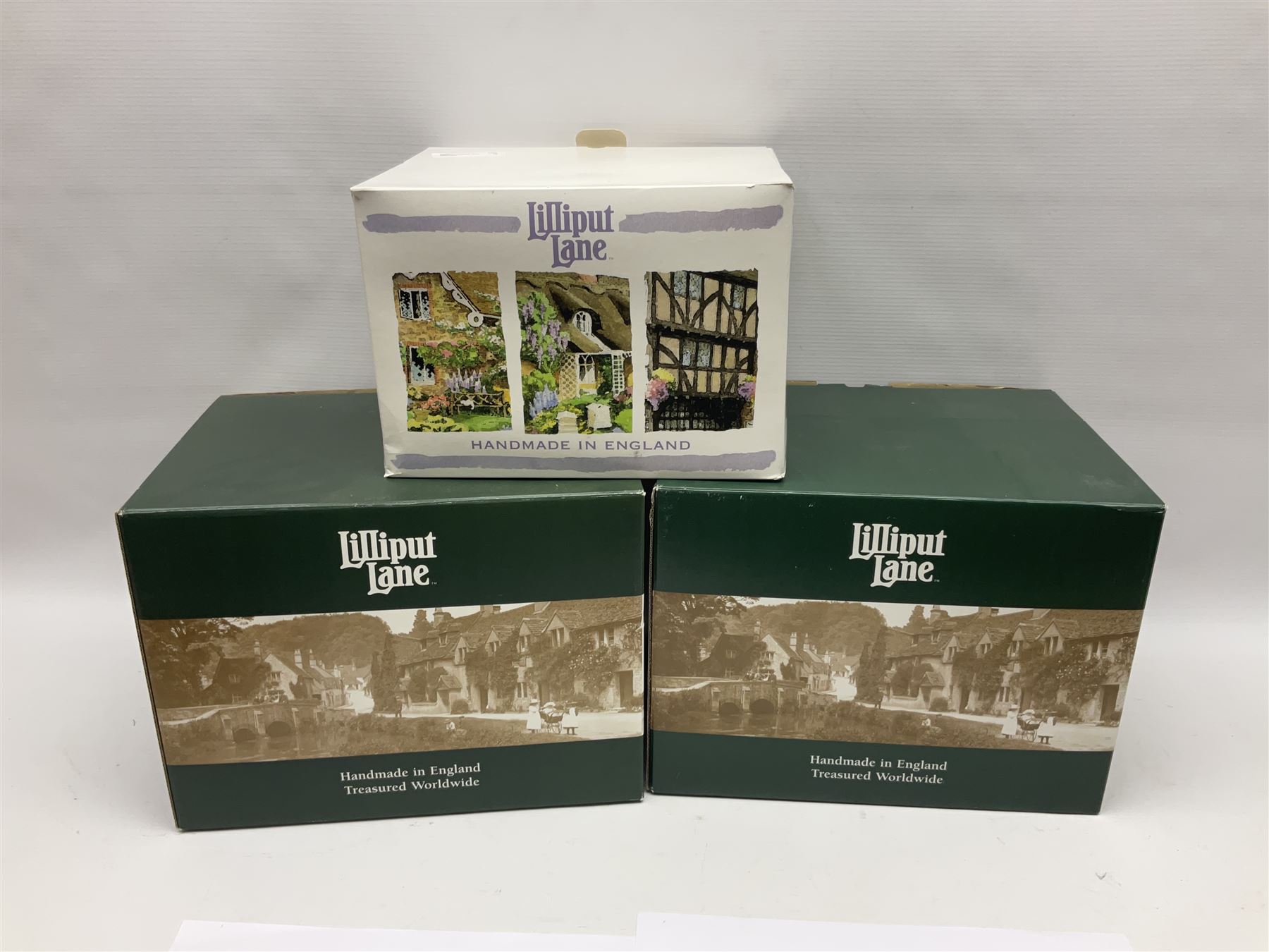 Three Lilliput Lanes, comprising Haworth Village, Homeward Bound for Christmas and Full Steam Ahead, with original boxes