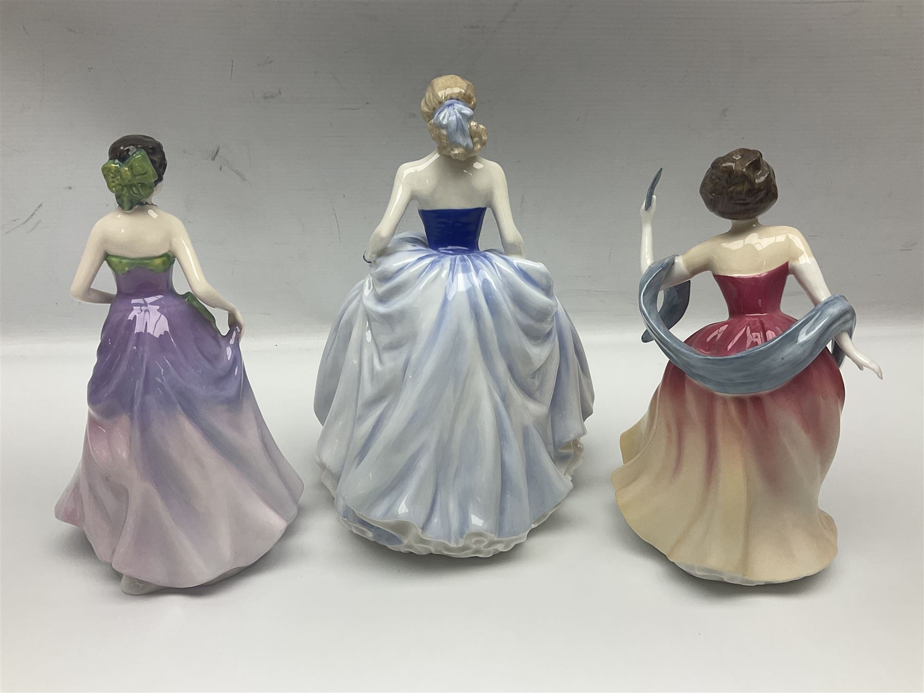 Seven Royal Doulton figures, to include Charity HN3087, Faith HN3082, Hope HN3061, Belle HN3703, etc, all with printed marks beneath