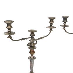Pair of silver plated three branch candelabra, each with three urn-shaped sconces, with scroll arms, tapering stem upon a circular base, together with silver plated wine flagon