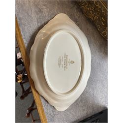 Late 20th century Royal Worcester dish, of oval form with gilt shaped rim and twin shell handles, hand painted by Jason Bowman with still life of fruit upon mossy ground, signed J Bowman, wit marks beneath, with makers fitted card box


