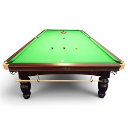Riley England - full size snooker table, traditional timber framed table fitted with green baize cloth, leather drop pockets, turned legs with stretcher bars, slate bed; with accessories to include, cues and stand, rests, ball, iron, brush and cover