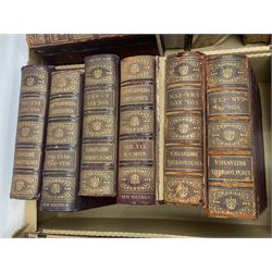 Thirty six volumes of Encyclopaedia Britannica with gold tooled red leather spines in various editions 