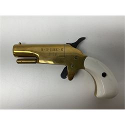SECTION 1 FIRE-ARMS CERTIFICATE REQUIRED - Spanish Ardesa percussion vest pocket Derringer pistol, .31 cal. black powder; single shot; 6cm barrel; all brass body with white grips; no.14-13-013682-10 with Spanish certificate dated 2010 and box of one hundred balls