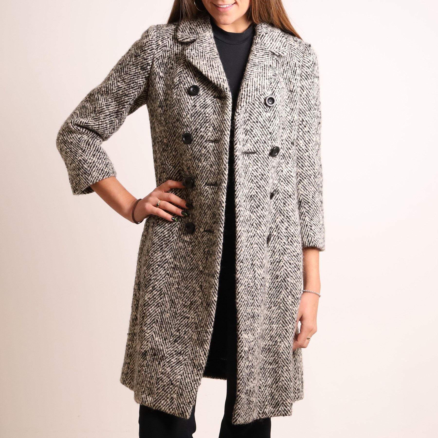 Barbour and Aquascutum - three ladies’ coats, comprising a Barbour Classic Duffle in dark brown wool blend with toggle fastenings and signature tartan lining, size UK 8, together with two Aquascutum herringbone wool coats, each double-breasted and fully lined, both bearing Regent Street London labels (3)