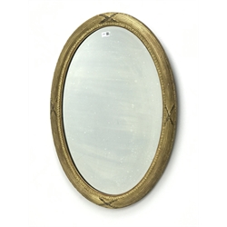  Early 20th century oval bevel edge gilt framed mirror, W57cm, H86cm  