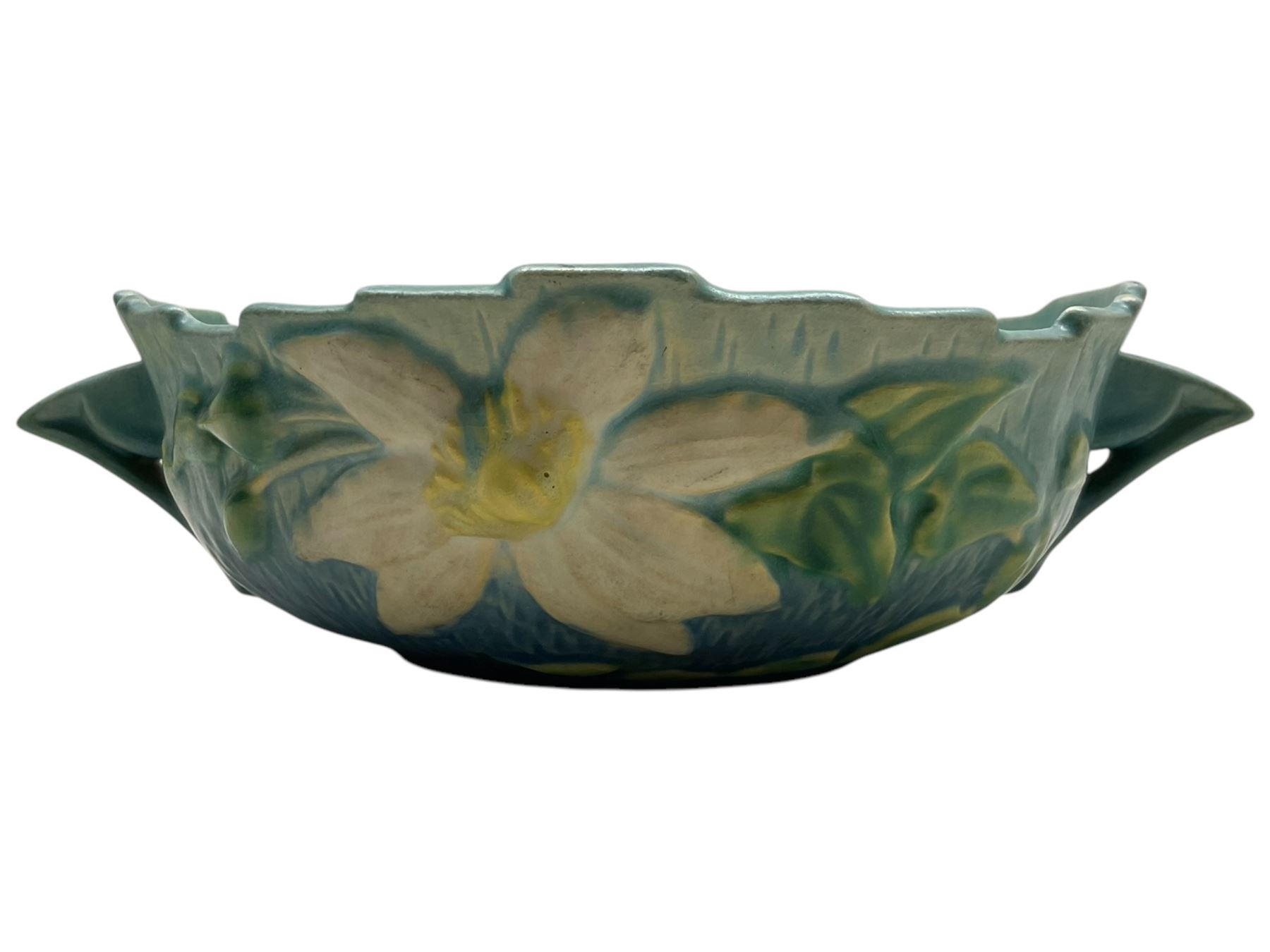 Roseville pottery twin handled bowl, decorated with clematis on a blue ground, marked ‘Roseville USA 457-8’ to the base
