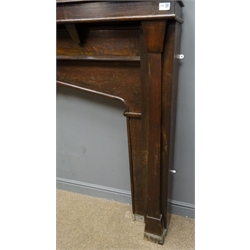  Early 20th century oak fire surround, architectural form with crenel style cornice, five painted panels depicting scenes of York, two turned column supports, pointed arched fire aperture, W159cm, H194cm, D20cm  