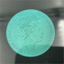 Queen Elizabeth II Bailiwick of Guernsey 2019 'The Titanium Moonlanding' fifty pence three coin set, comprising 'Green', 'Orange' and 'Blue' titanium coins, in capsules and case with certificate