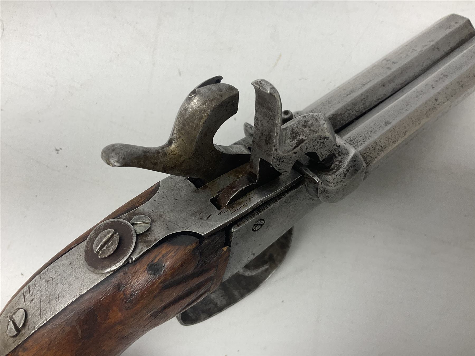 19th century Belgian double barrel side by side percussion pistol, approximately 40 calibre, with 8cm octagonal barrels, and wooden stock L22cm