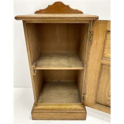 Edwardian ash bedside cabinet, raised shaped back, single cupboard, platform base 