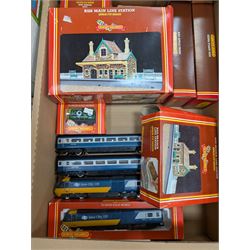 Collection of mostly Hornby '00' gauge model railway, including two Inter-City locomotives and carriages, railway buildings and scenery, track, controllers and other accessories, some boxed and some empty boxes