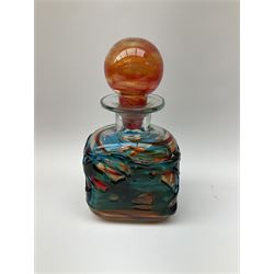 Mdina art glass decanter of red and orange glass with blue trellis work, with a glass ball stopper, signed beneath, together with two pink glass vases, a selection of carnival glass etc. 
