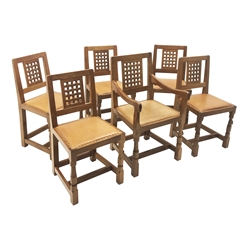  Set six (5+1) 'Mouseman' lattice carved back dining chairs with studded leather seats on octagonal supports joined by stretchers, W52cm  