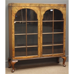  Maple & Co. figured walnut display cabinet, two stepped arched astragal glazed doors enclosing three shelves, cabriole supports, W96cm, H108cm, D29cm  